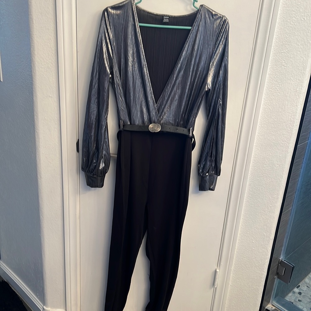 Black and silver jumpsuit with belt. Worn once